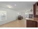 Bright living room with tiled floors and comfortable seating at 5201 W Camelback Rd # A187, Phoenix, AZ 85031