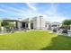 Expansive backyard with pool, lawn, and patio areas at 6862 E Joshua Tree Ln, Paradise Valley, AZ 85253