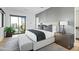 Bright bedroom with sliding door to backyard at 6862 E Joshua Tree Ln, Paradise Valley, AZ 85253