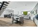 Living area with modern furniture, wet bar, and open floor plan at 6862 E Joshua Tree Ln, Paradise Valley, AZ 85253