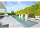 Relaxing pool with spa and spacious patio at 6862 E Joshua Tree Ln, Paradise Valley, AZ 85253