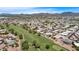 Wide aerial view of the community and surrounding landscape at 8257 E Dutchman Dr, Mesa, AZ 85208