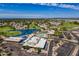 Community overview featuring a pool, clubhouse, and golf course at 8257 E Dutchman Dr, Mesa, AZ 85208