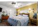 Spacious bedroom with a comfortable bed and plenty of closet space at 8257 E Dutchman Dr, Mesa, AZ 85208