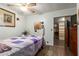 Cozy bedroom with a comfortable bed and ample closet space at 8257 E Dutchman Dr, Mesa, AZ 85208