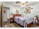 Charming bedroom with a queen-size bed and wooden furniture at 8257 E Dutchman Dr, Mesa, AZ 85208