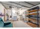 Laundry area with washer, dryer, and ample storage shelving at 8257 E Dutchman Dr, Mesa, AZ 85208