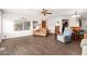Spacious living room featuring hardwood floors and ample natural light at 8257 E Dutchman Dr, Mesa, AZ 85208