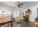 Bright home office with built-in desk and hardwood floors at 8257 E Dutchman Dr, Mesa, AZ 85208