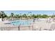 Relaxing community pool with lounge chairs at 8257 E Dutchman Dr, Mesa, AZ 85208