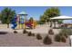 Community playground with playset, slide, and covered picnic area at 1403 E Jacqueline Pl, Casa Grande, AZ 85122