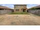 House's backyard with artificial turf and block wall at 4042 W Kirkland Ave, San Tan Valley, AZ 85144