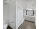 Clean bathroom with a bathtub, double vanity, and tiled floor at 4042 W Kirkland Ave, San Tan Valley, AZ 85144