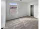 Simple bedroom with carpeted floor and a closet at 4042 W Kirkland Ave, San Tan Valley, AZ 85144