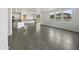 Kitchen with a large island, white cabinets, and dark countertops at 4042 W Kirkland Ave, San Tan Valley, AZ 85144
