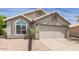 Charming single story home with a two car garage and well maintained landscaping at 4112 E Tanglewood Dr, Phoenix, AZ 85048