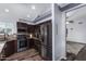 Modern kitchen with dark wood cabinets and stainless steel appliances at 4112 E Tanglewood Dr, Phoenix, AZ 85048
