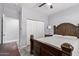 Bedroom with dark wood bed frame and double door closet at 4229 N 32Nd Ave, Phoenix, AZ 85017