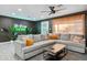 Spacious living room with sectional sofa and large TV at 2401 N 37Th St, Phoenix, AZ 85008