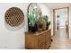 Bright hallway features decorative wooden console table and mirror at 3815 E Berridge Ln, Paradise Valley, AZ 85253