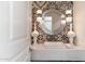 Stylish powder room with patterned tile, modern sink, and elegant mirror at 3815 E Berridge Ln, Paradise Valley, AZ 85253