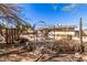 Backyard patio with pergola and seating area at 411 N 111Th Pl, Mesa, AZ 85207