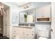 Clean bathroom with white vanity, gray countertop, and shower/tub combo at 4937 N Granite Reef Rd, Scottsdale, AZ 85251