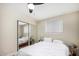 Comfortable bedroom with mirrored closet doors and a double bed at 4937 N Granite Reef Rd, Scottsdale, AZ 85251