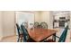 Dining area with wooden table and chairs near kitchen at 4937 N Granite Reef Rd, Scottsdale, AZ 85251