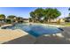 Refreshing community pool surrounded by lush landscaping at 4937 N Granite Reef Rd, Scottsdale, AZ 85251