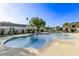 Inviting kidney-shaped community pool with surrounding patio at 4937 N Granite Reef Rd, Scottsdale, AZ 85251