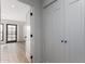 Hallway with white doors and light wood flooring at 6223 N 12Th St # 24, Phoenix, AZ 85014