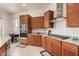 Modern kitchen with gas cooktop and ample counter space at 7266 W Meadowlark Way, Florence, AZ 85132