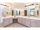 Double vanity bathroom with ample counter space at 8431 W Utopia Rd, Peoria, AZ 85382