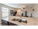 Granite countertops and stainless steel sink in a spacious kitchen at 13157 E Chuparosa Ln, Florence, AZ 85132