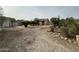 Large backyard with gravel and minimal landscaping at 15445 N Verde St, Surprise, AZ 85378