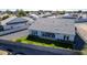 Aerial view of house showcasing backyard, grassy area, and a trampoline at 1704 E Melrose St, Mesa, AZ 85203