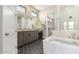 Elegant bathroom with a walk-in shower and hexagonal tile floor at 1704 E Melrose St, Mesa, AZ 85203