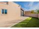 Backyard with artificial turf and stucco wall at 18548 E Parada Cir, Rio Verde, AZ 85263