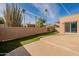 Backyard with artificial turf and gated access at 18548 E Parada Cir, Rio Verde, AZ 85263