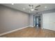 Light-filled bedroom with wood-look floors and neutral walls at 18548 E Parada Cir, Rio Verde, AZ 85263