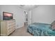 Bright bedroom with a bed and access to another room at 21617 N 30Th Ave, Phoenix, AZ 85027