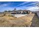 Backyard view showcasing a basketball court and patio area at 2438 E Atlanta Ave, Phoenix, AZ 85040