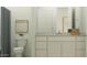 Clean bathroom with a vanity, toilet, and shower at 25153 N 177Th Dr, Surprise, AZ 85387