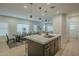 Modern kitchen with dark cabinetry, quartz countertops, and stainless steel appliances at 3144 S Joslyn --, Mesa, AZ 85212