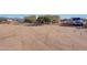 Large desert lot with a single story home and a large truck at 31515 N 160Th St, Scottsdale, AZ 85262