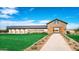 Community entrance with barn-style gate and landscaping at 4337 E Bradford Ave, San Tan Valley, AZ 85140