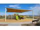 Community playground with shaded play structure and play area at 4337 E Bradford Ave, San Tan Valley, AZ 85140