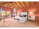 Spacious main bedroom with a king-size bed, fireplace, and access to a balcony at 7500 E Mccormick Pkwy # 29, Scottsdale, AZ 85258