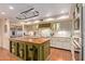 Updated kitchen with stainless steel appliances and a large island at 7500 E Mccormick Pkwy # 29, Scottsdale, AZ 85258